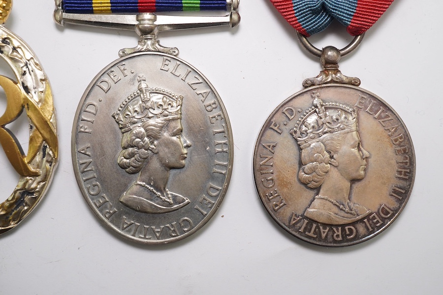 Four ERII service medals; Imperial Service medal to Alexander Manuel, another to Sydney John Jeffery (Technician Class IIA, Telecommunications Headquarters; Civil Defence Long Service unnamed; Territorial Efficiency Deco